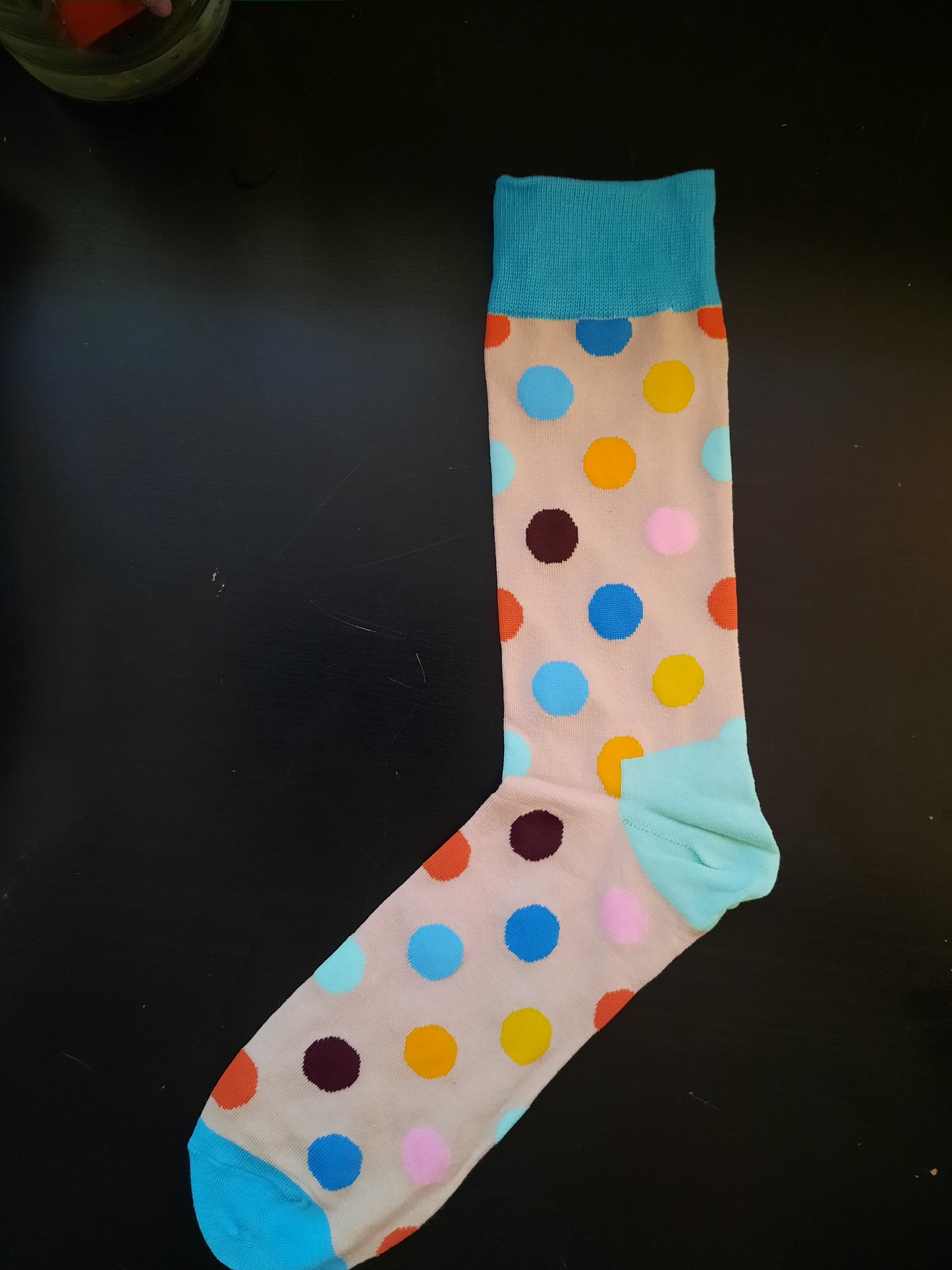 Beige socks with multi-colored polka dots