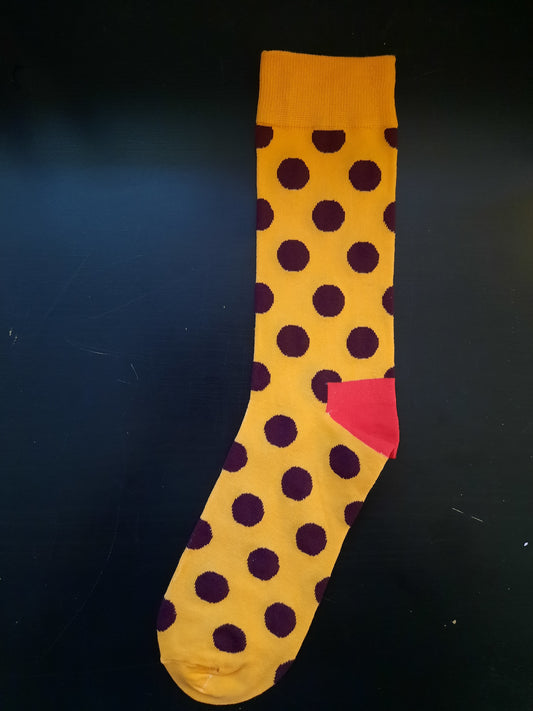 Orange socks with brown polka dots