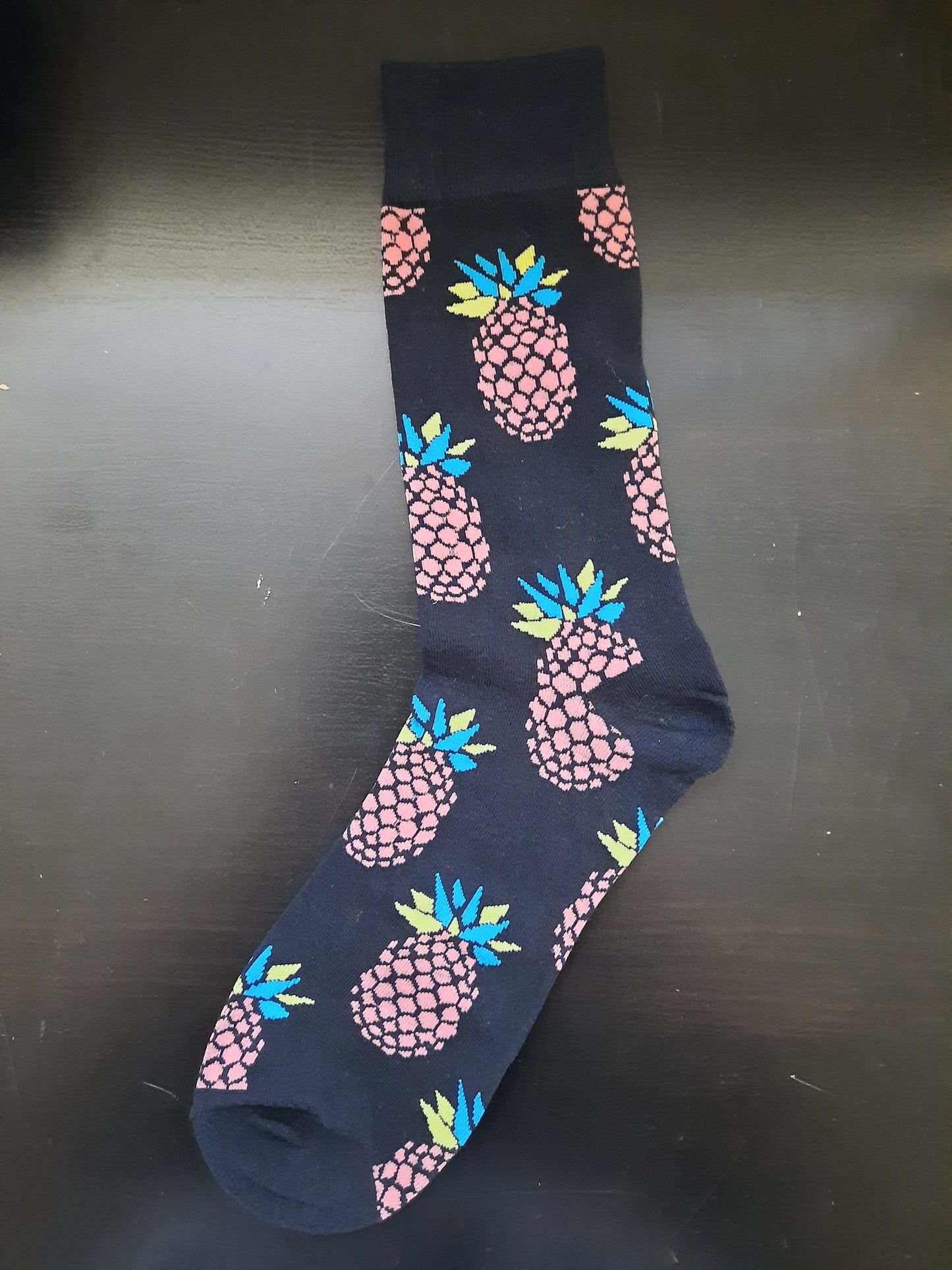 Black socks with brown, yellow and blue pineapples - Fruit