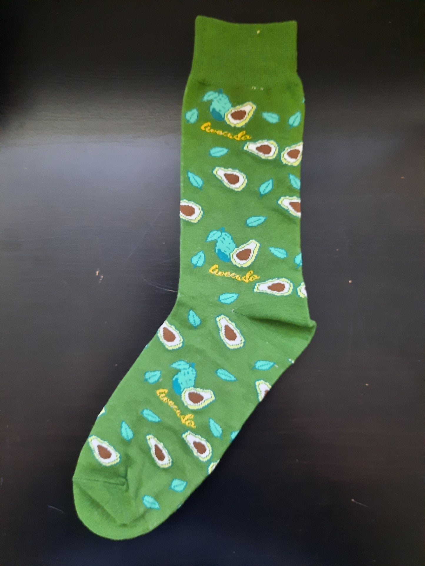 Green socks with avocados