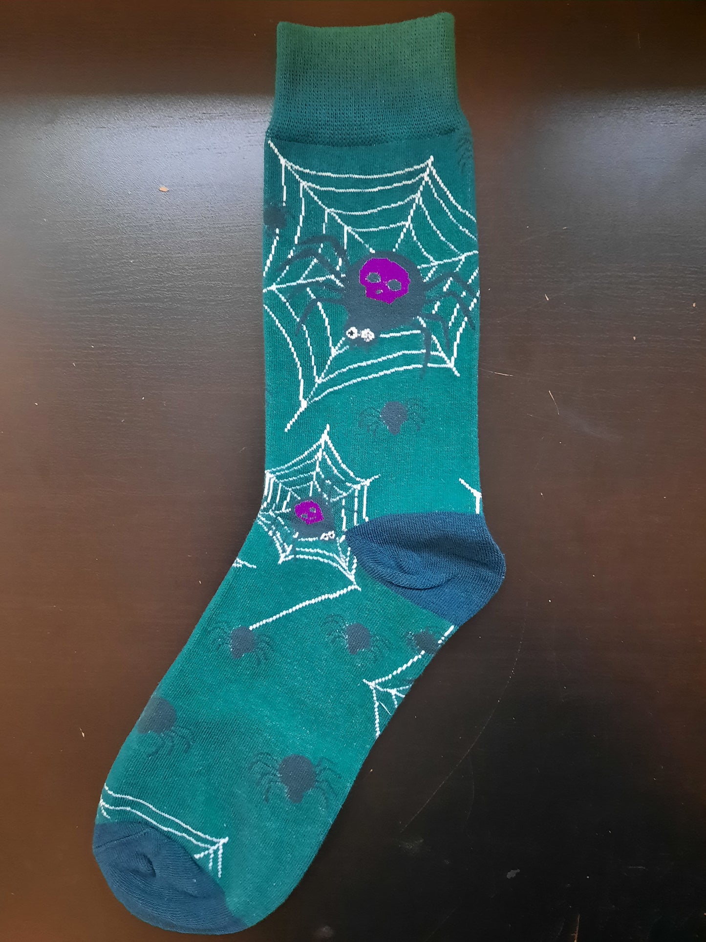 Green socks with spiders